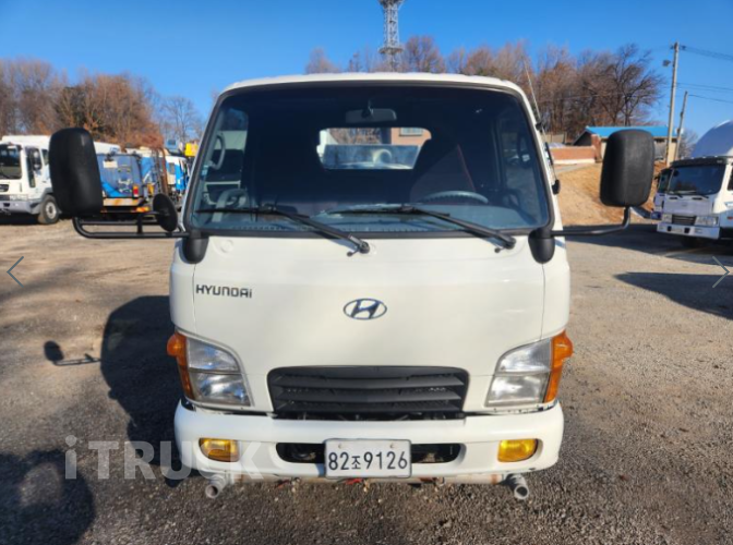 현대 살수차 마이티큐티 스텐탱크 2,400L 수동 1