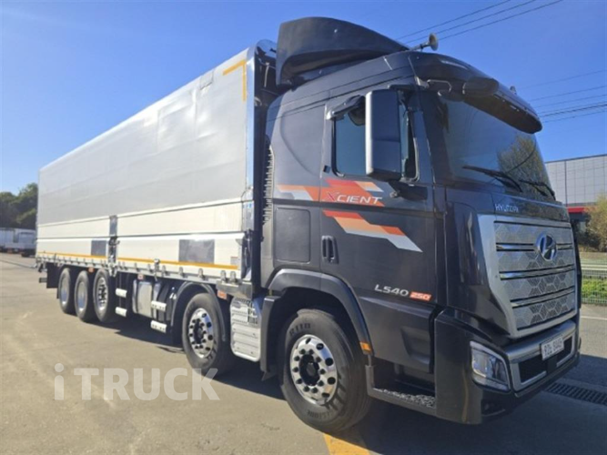 현대 트라고엑시언트 540 앞축 상승윙바디 25톤 오토 1