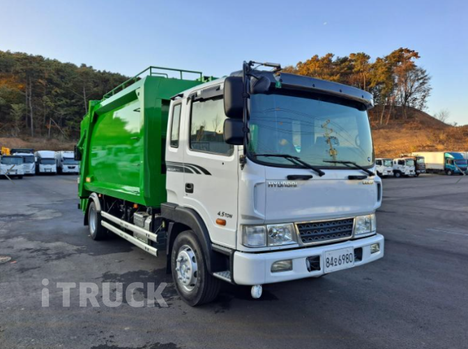 현대 압축진개 메가트럭 5톤 밀판식 배출 1