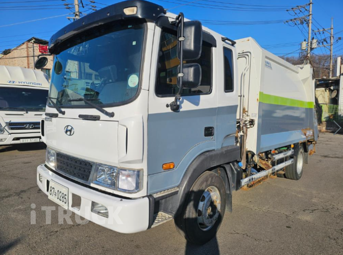 현대 압축진개 메가트럭 5톤 밀판식 배출 - 중고 트럭 매물 이미지