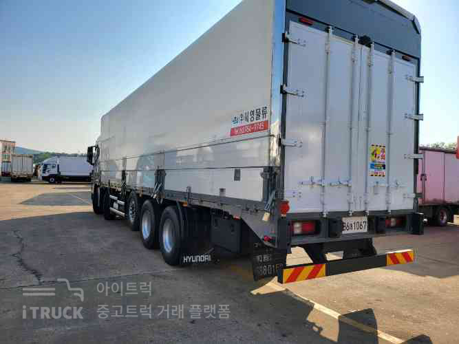 엑시언트 540 앞축 상승윙바디 25톤 오토